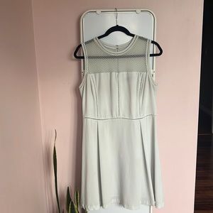 Fit & flare dress with embroidery at neckline. Size L.